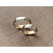 Обручальные кольца из комбинированного золота с вращающимся центром